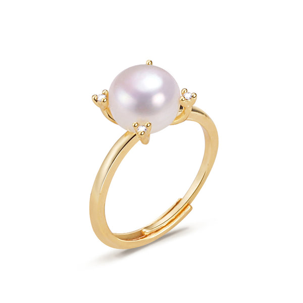 Anillo de perla estilo coreano con corte de cuatro garras y circonitas.