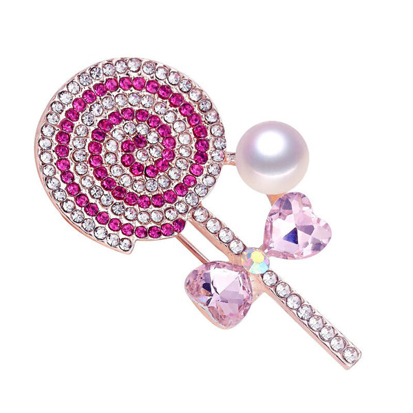 Broche de perlas naturales de agua dulce de alta calidad con forma de piruleta rosa y azul.