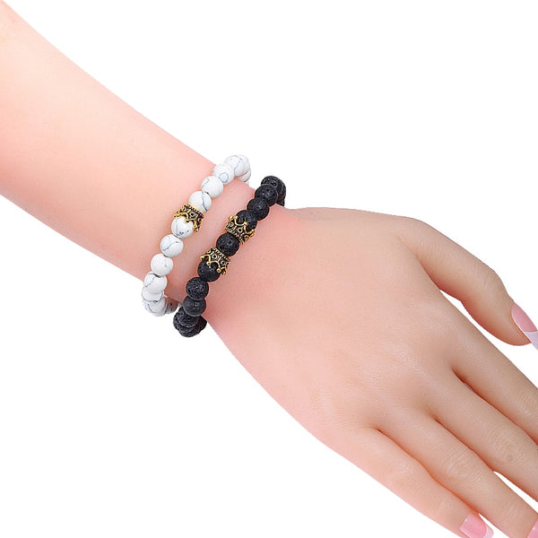 Juego de 2 pulseras clásicas de piedra natural con distancia, abalorios de lava negra para hombre, con corona y cuentas.