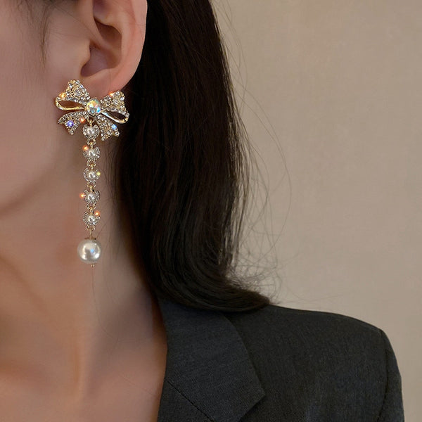 Pendientes colgantes de diamantes de imitación con lazo estilo coreano para mujer, pendientes largos con borlas y perlas.