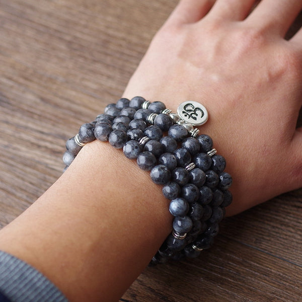 Pulsera de yoga con dije de Buda OM