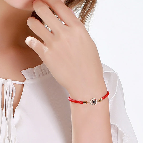 Pulsera del zodiaco en oro rosa con piedras de proyección "Te amo"