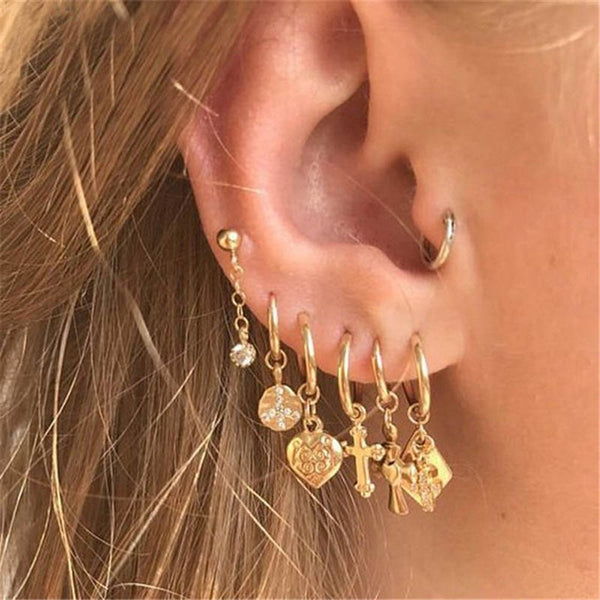 Conjunto de pendientes geométricos vintage con forma de corazón, cruz y bola de oro