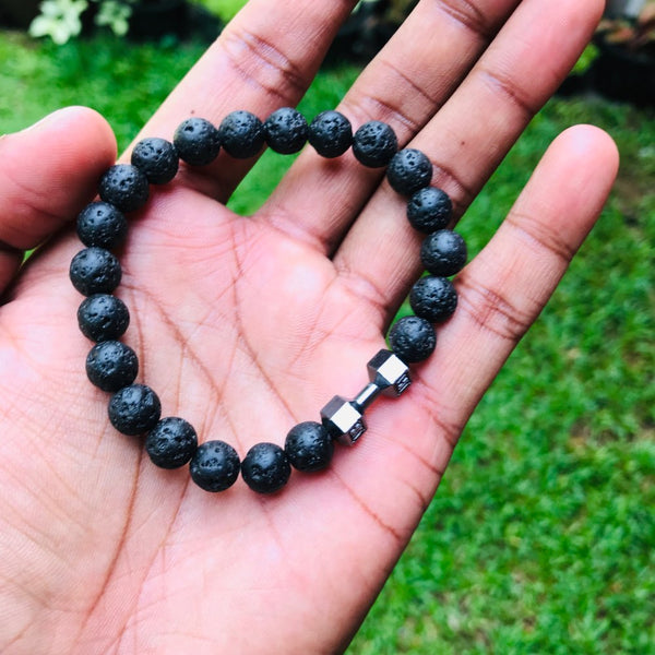 Pulsera con mancuernas de piedra volcánica negra natural