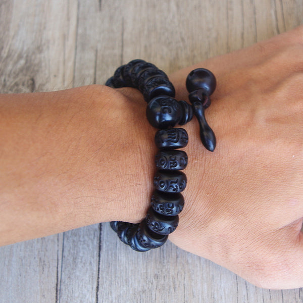 Pulsera OM de madera de azufaifo con rayo de Buda